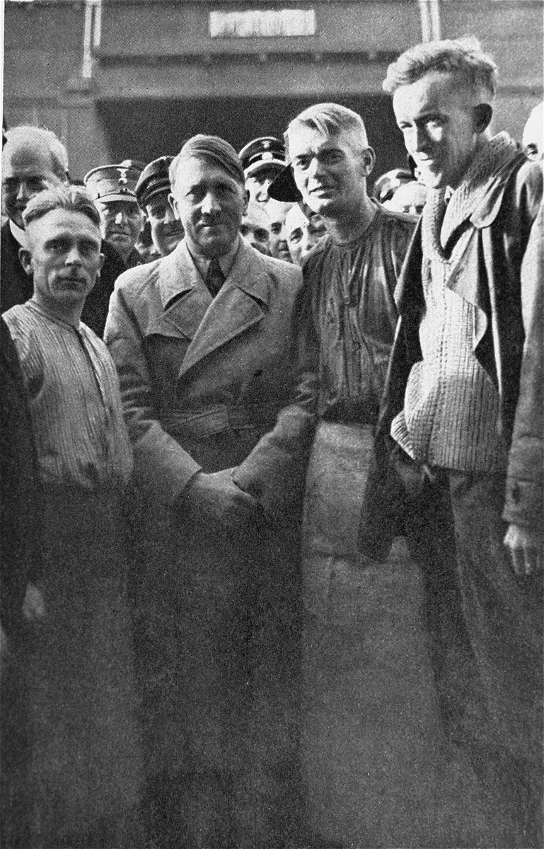 Adolf Hitler with workers at the Siemens factory